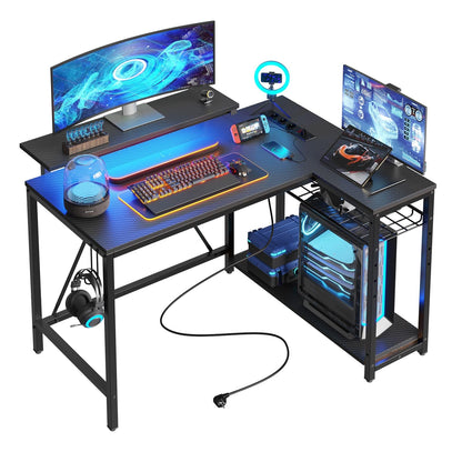 Bestier L-Form Gaming Eckschreibtisch 106,5 cm, umkehrbar, mit LED & Steckdosen, Regale